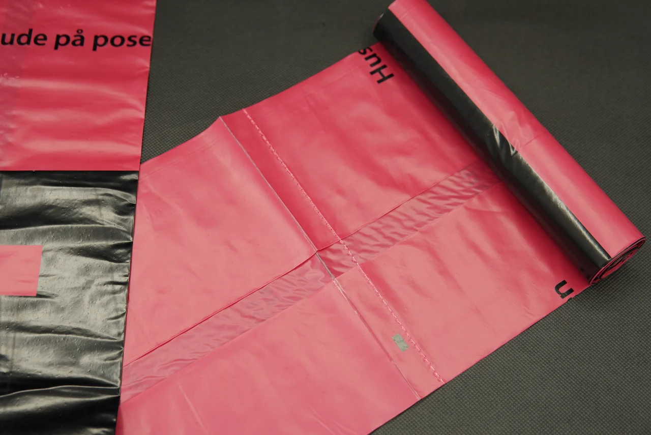 Close-up of C-Fold drawstring garbage bag roll detailing material quality