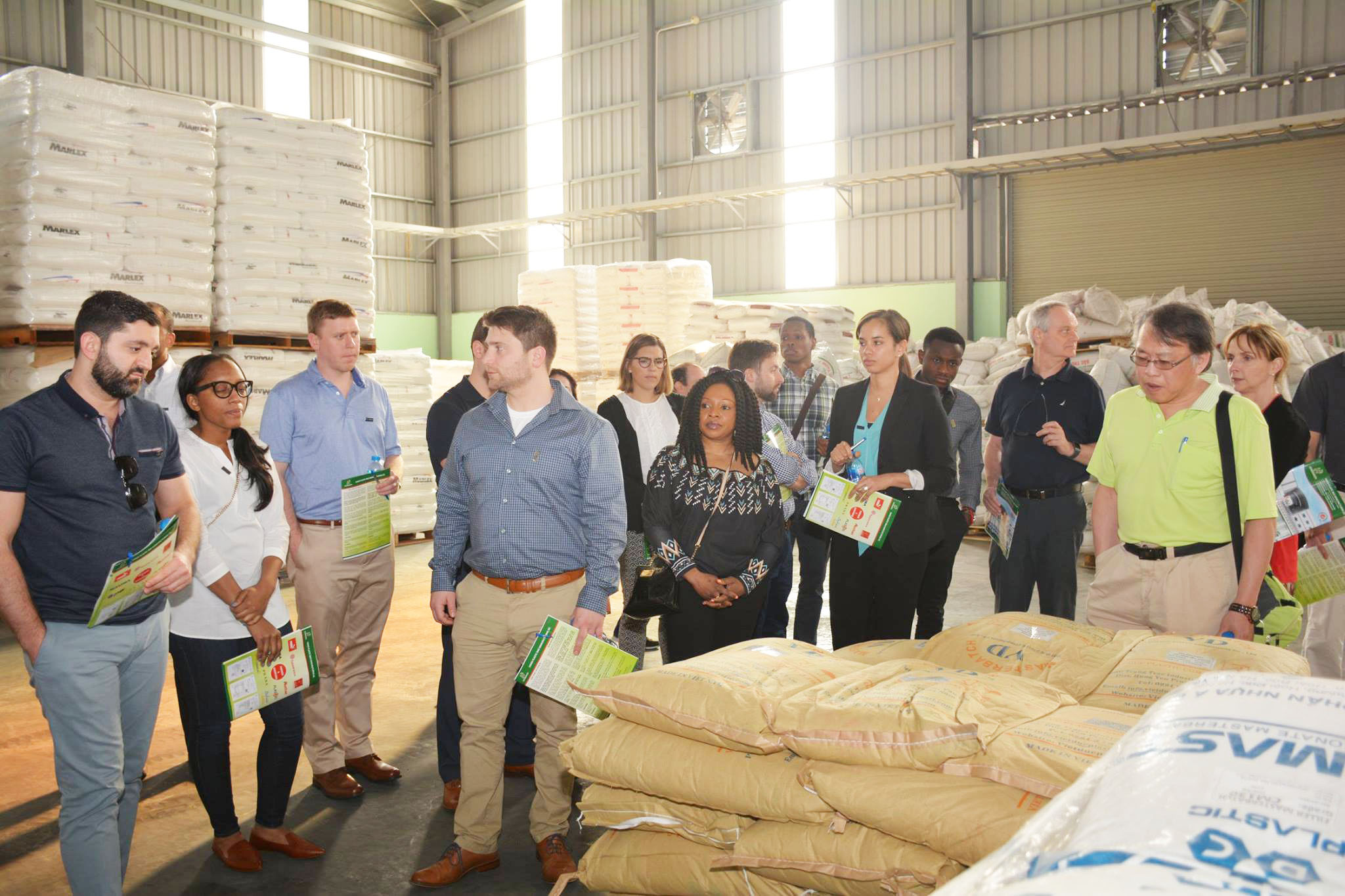 UConn School of Business delegation visiting the raw material warehouse at Hanoi Plastic Bag Manufacturing JSC