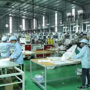 Advanced trash bag manufacturing line producing garbage bags for export at Hanoi Plastic Bags Manufacturing JSC Vietnam