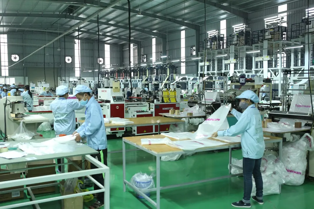 Advanced trash bag manufacturing line producing garbage bags for export at Hanoi Plastic Bags Manufacturing JSC Vietnam